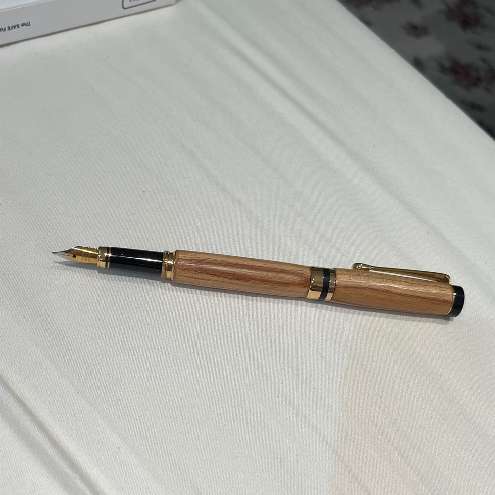 Elegant Wooden Fountain Pen with Gold Accents
